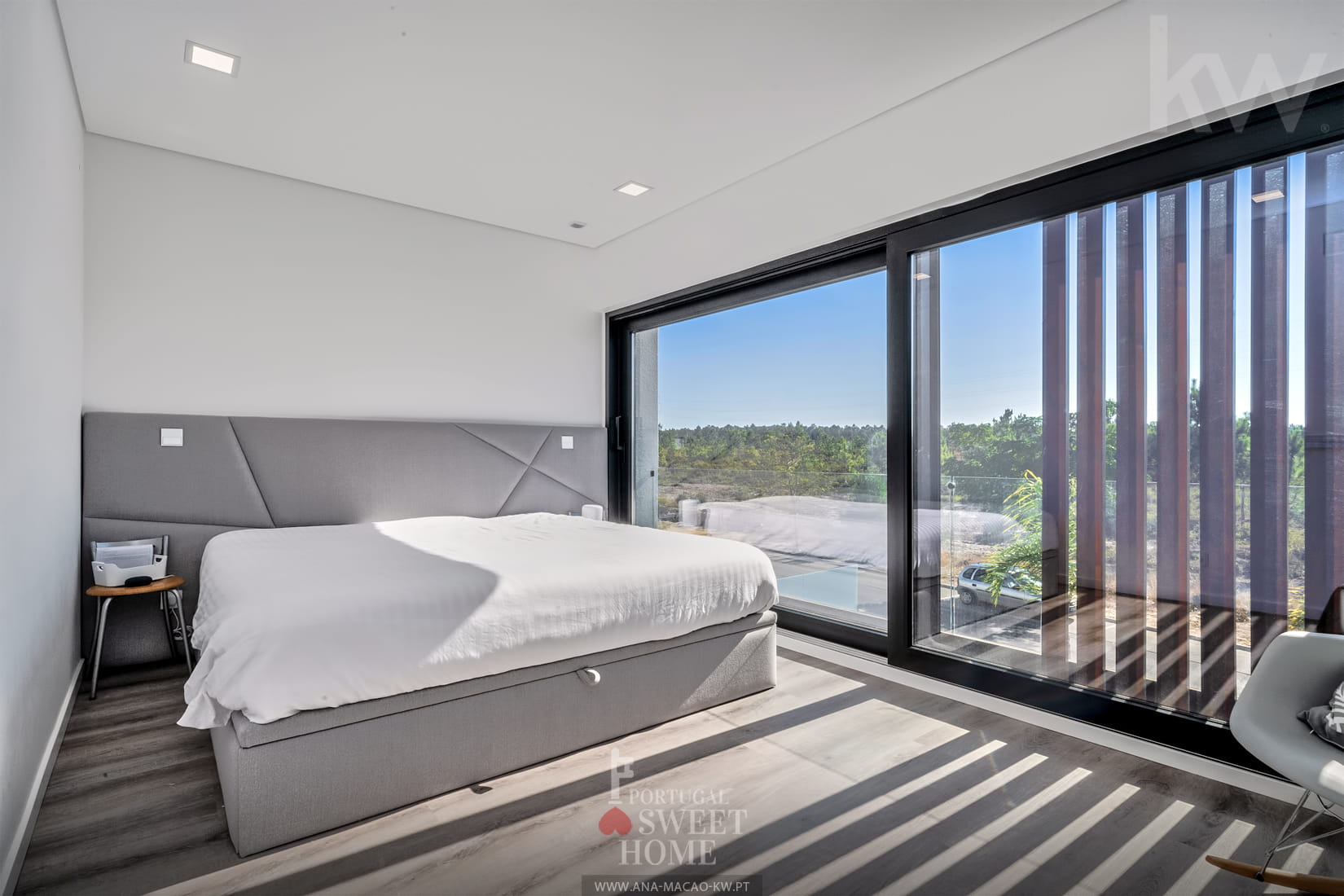 Master suite with large windows
