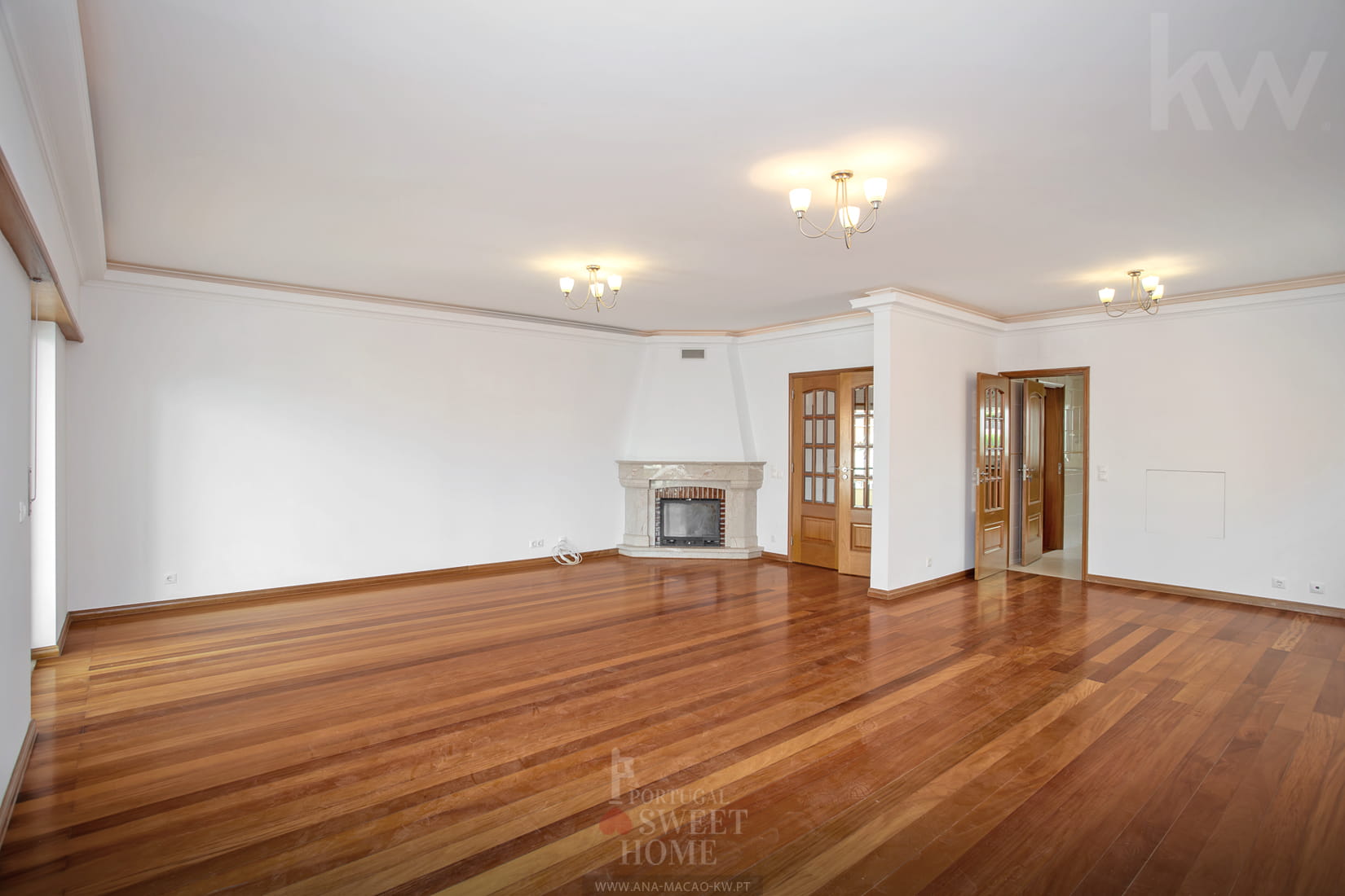 Large, very bright living room with fireplace