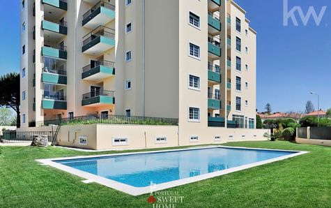 View of condo with pool