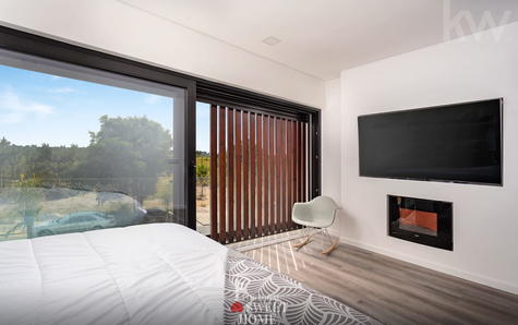 Master suite with large windows