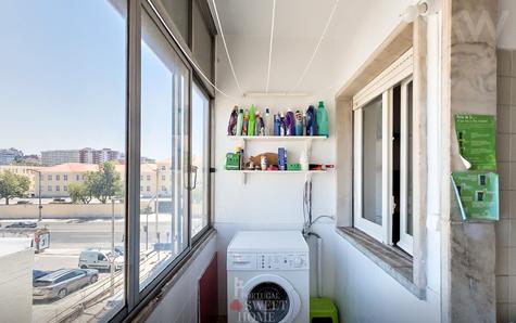 Kitchen awning with laundry area