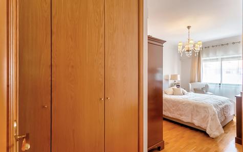 Bedroom with built-in cupboards