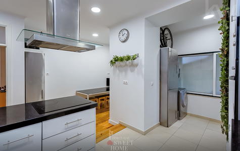 View of the kitchen and access to the laundry room (19.6 m²)