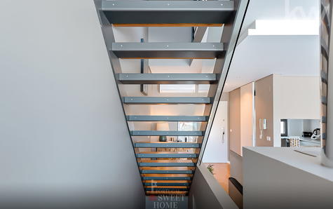 Escadaria de acesso ao piso dos quartos