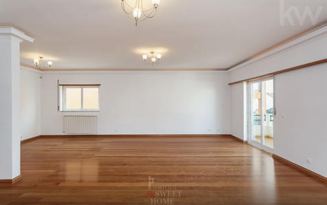 Large, very bright living room with fireplace