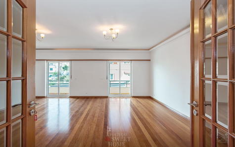Large, very bright living room with fireplace