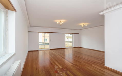 Large, very bright living room with fireplace