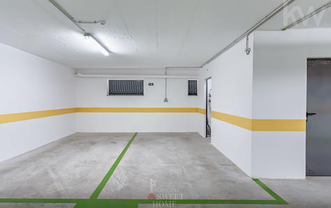 2 parking spaces in the building's garage