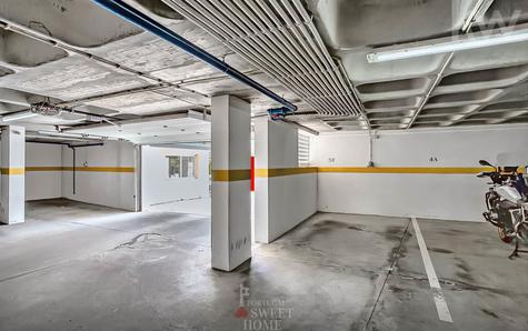 1 of 2 parking spaces in the building's garage