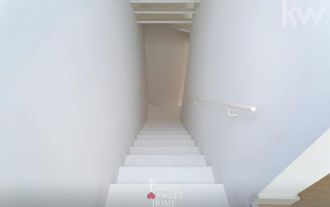 Staircase leading to the lower floor