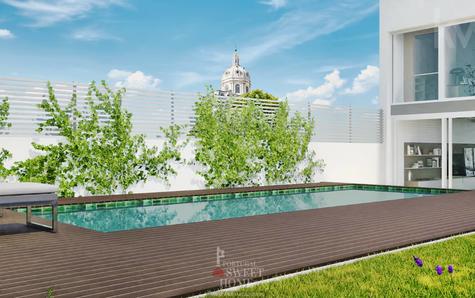 Piscina e jardim com vista para a Basílica da Estrela