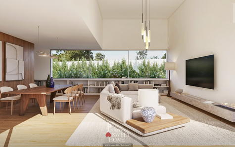 Bright living room measuring 49.4 m2 with views of the pool/garden.