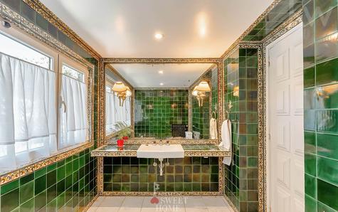 Bathroom supporting the bedrooms