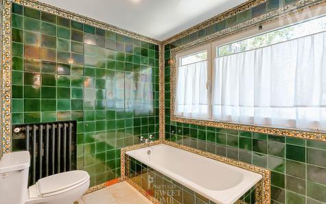 Bathroom supporting the bedrooms