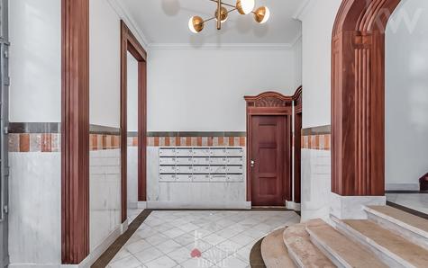 Entrance atrium of the building and access to the garage.