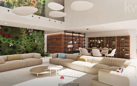 View of the double-height living room (82.36 m2) and the interior garden.