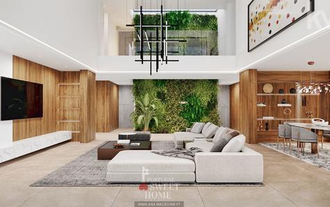 Vue du salon à double hauteur (82,36 m2) et du jardin intérieur.