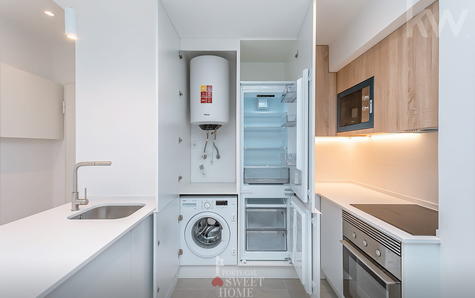 View of the fully equipped kitchen.