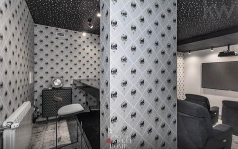 Home cinema with bar in the basement, attached to the games room.