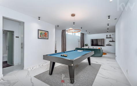 Salão de jogos em open space na cave