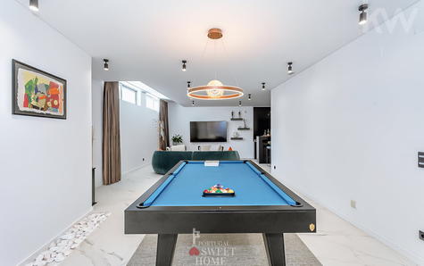 Salão de jogos em open space na cave