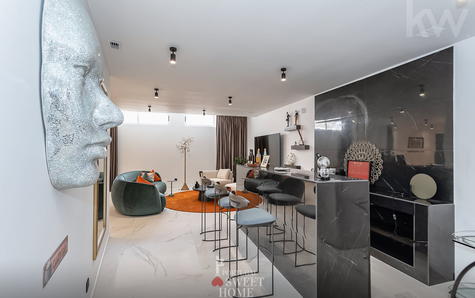 Bar with marble panel in the games room.