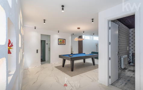 Salão de jogos em open space na cave